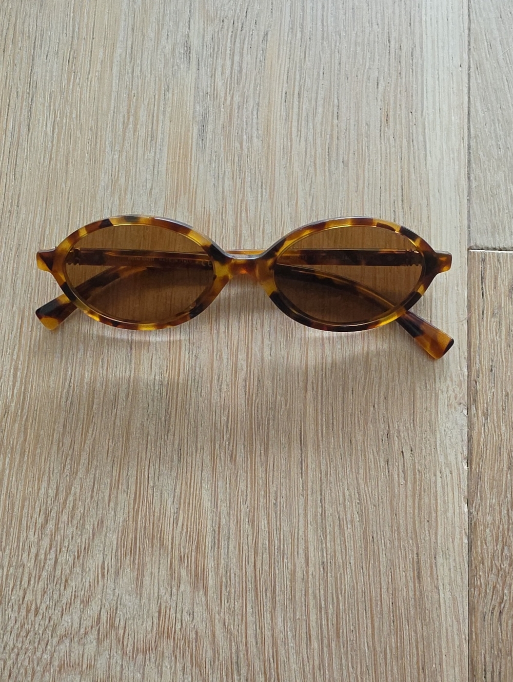 Miu Miu MU 04ZS Tortoiseshell Oval Sunglasses with Brown Lenses
